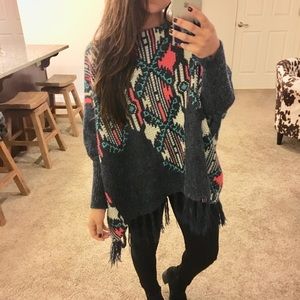 Cozy boho fringe poncho sweater